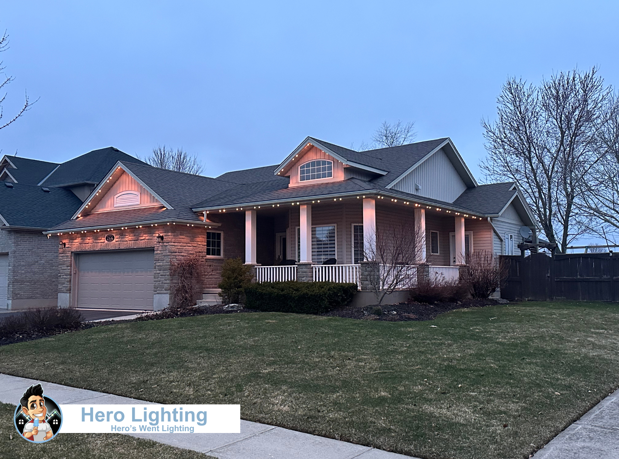 Permanent outdoor lighting on an Ontario home at dusk
